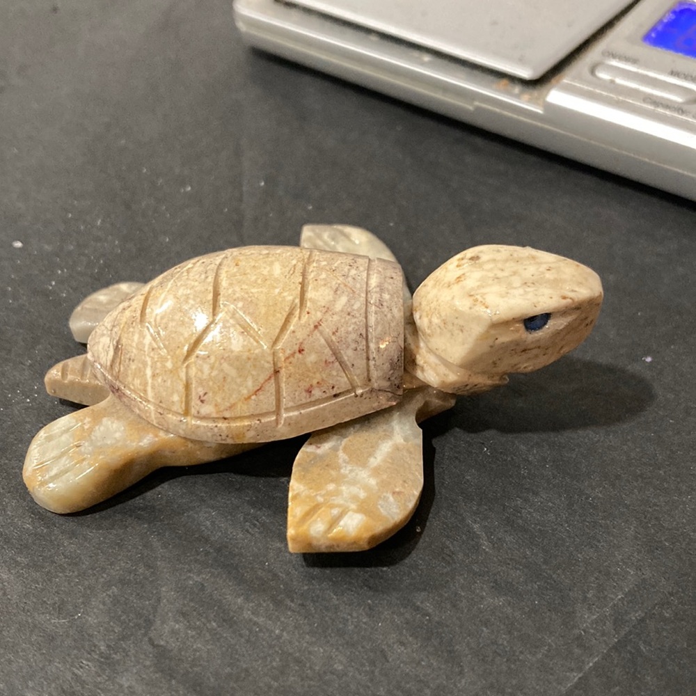 Carved turtle from polished picture jasper stone